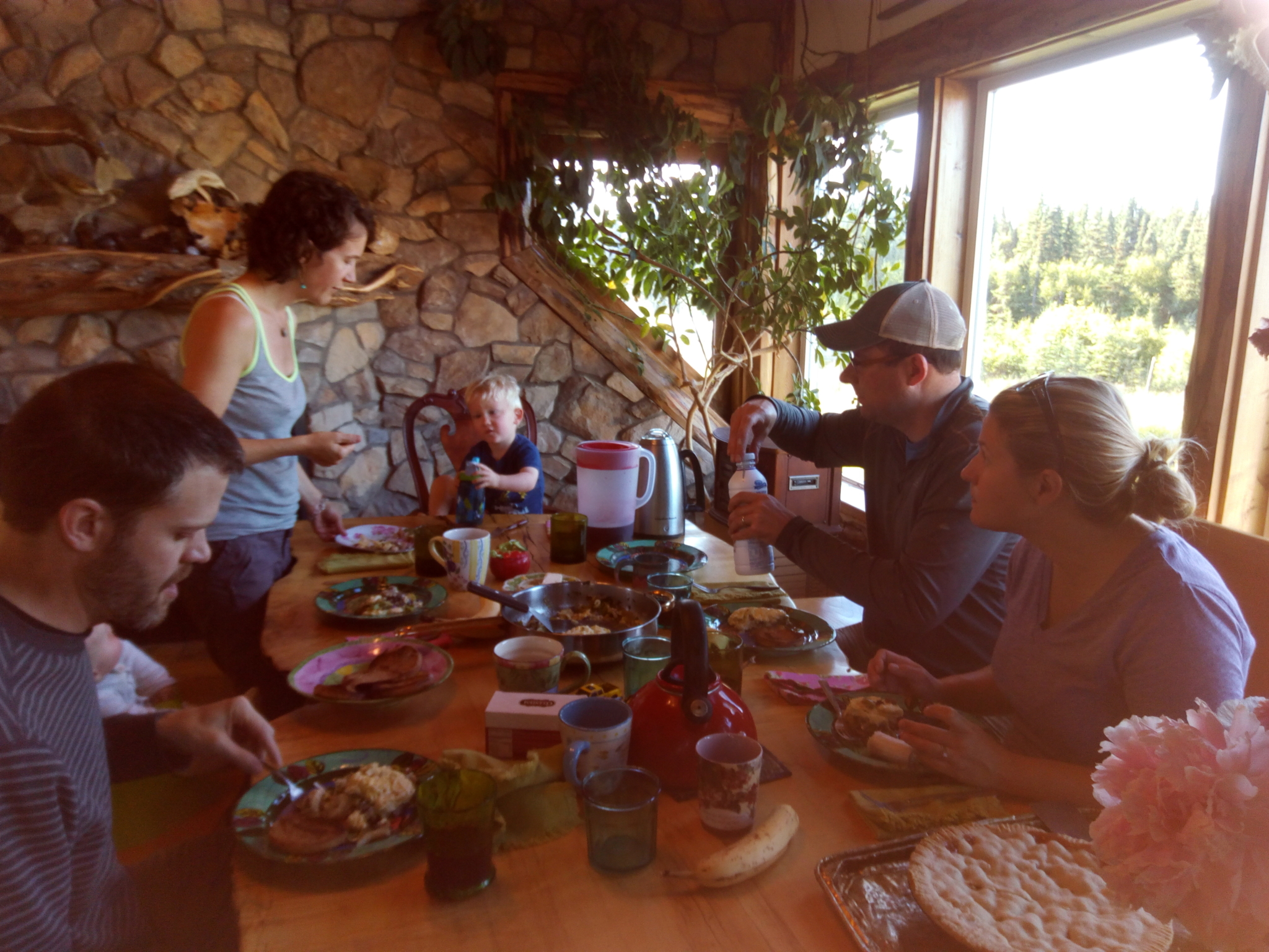 Family sitting down to breakfast.